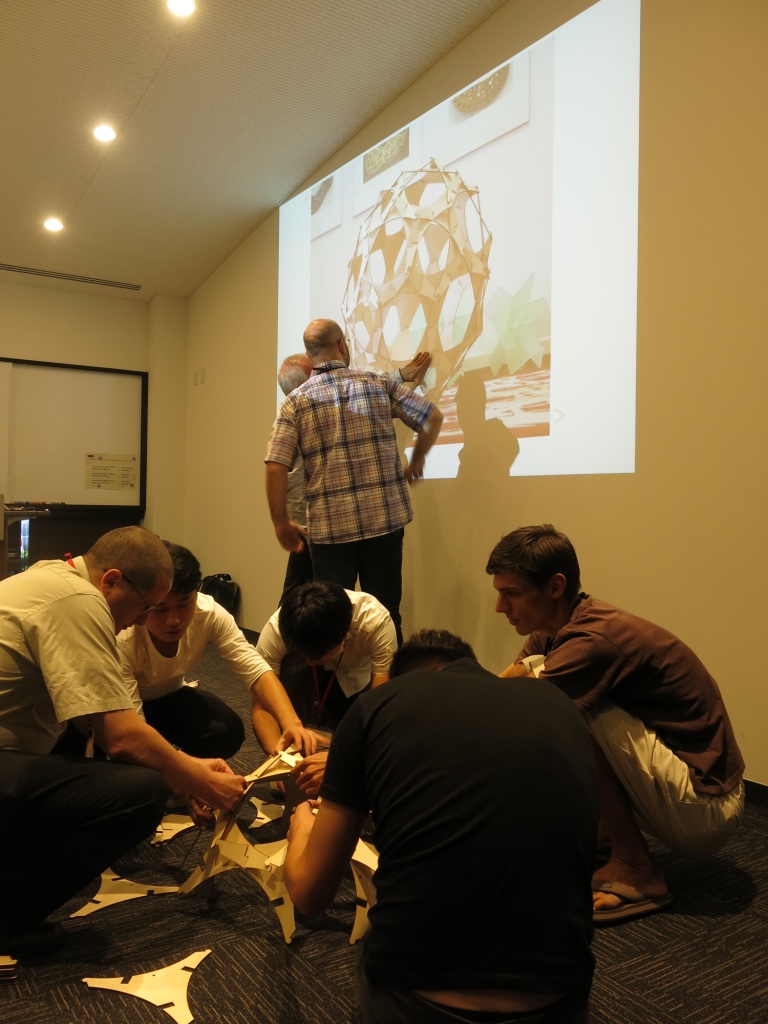 group assembling sculpture