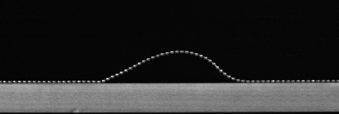 bead chain arch, grey on a black background
