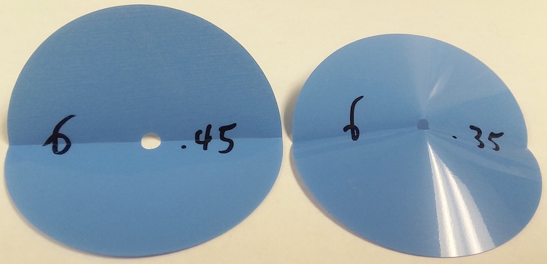 folded blue plastic circles with holes